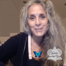 Natalie, the yoga teacher, smiling